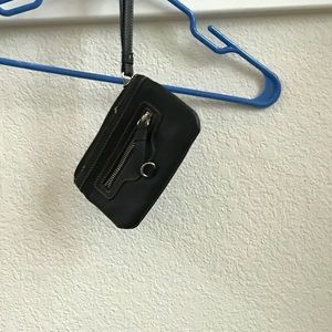 Black leather wristlet.